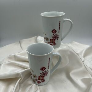 Pair of Tall Starbucks Christmas Mugs.